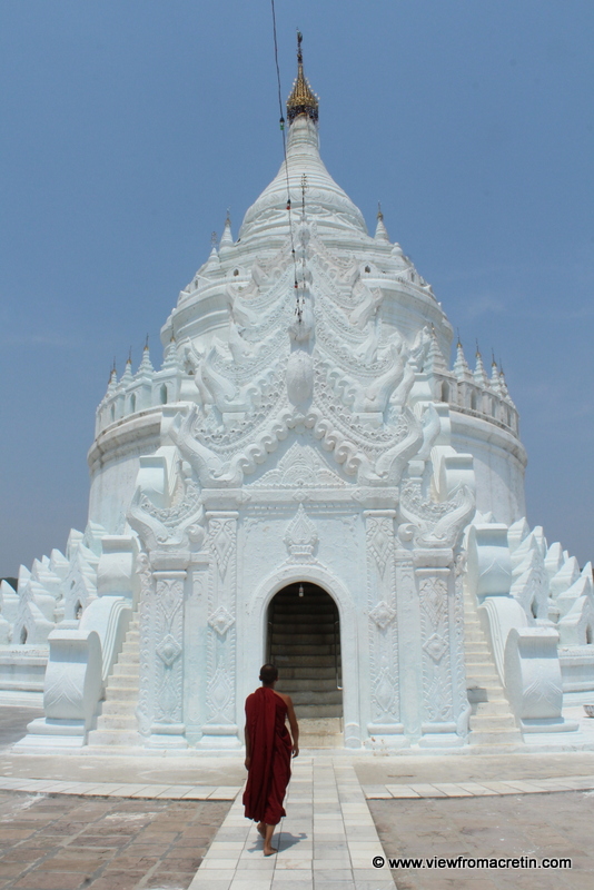 A monk ascends the steps of Hsinbyume Paya.